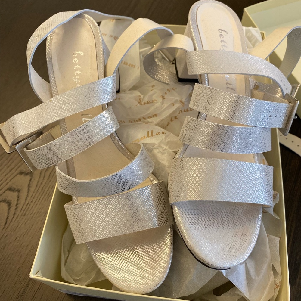Bettye Muller Silver tingle sandals.
